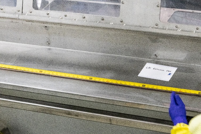 Taking Measurements of the Enriched Uranium-Zirconium Rod Post-Extrusion