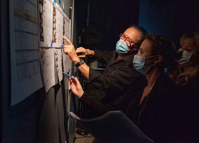 Clayton Talmon and Emma Brumpton review storyboards