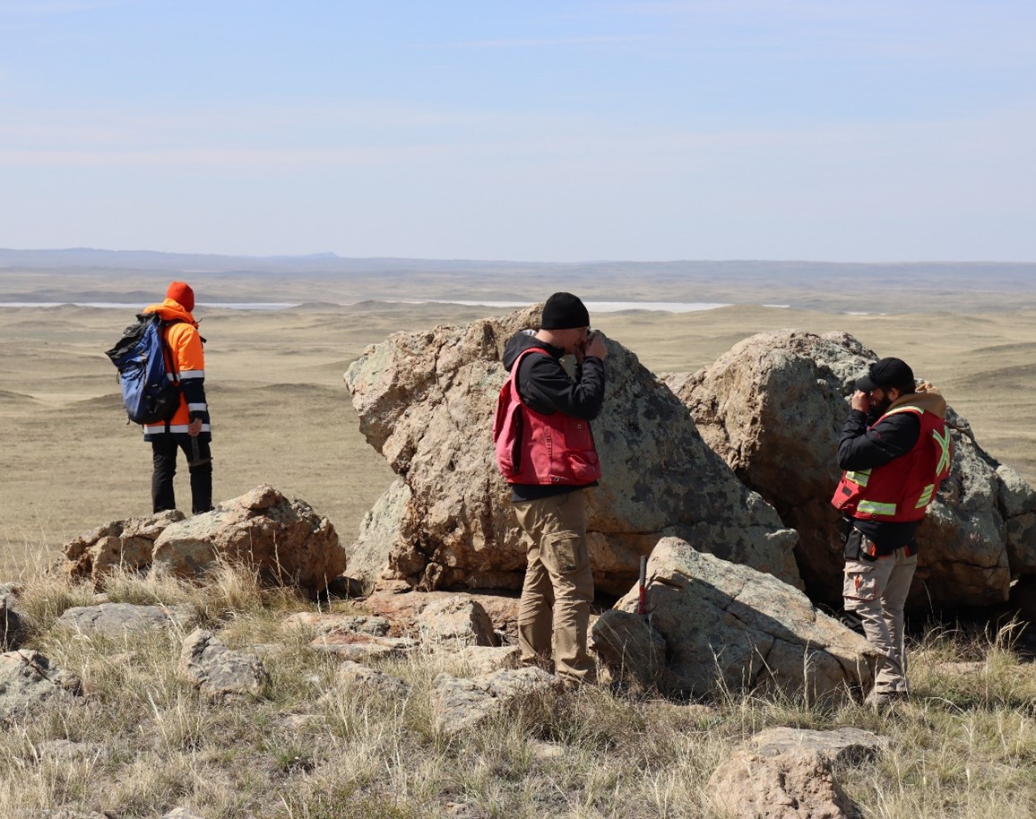 Geologists mapping in the field (Summer 2022)