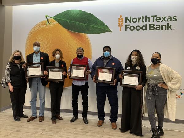 NTFB CEO Trisha Cunningham (L) alongside Danyel Surrency Jones (R) pose with Black Leadership Power of Community Awards honorees Randy and Lael Melville, Mitchell Ward, Pastor Tommy Brown, and Dr. Cheryl "Action" Jackson.
