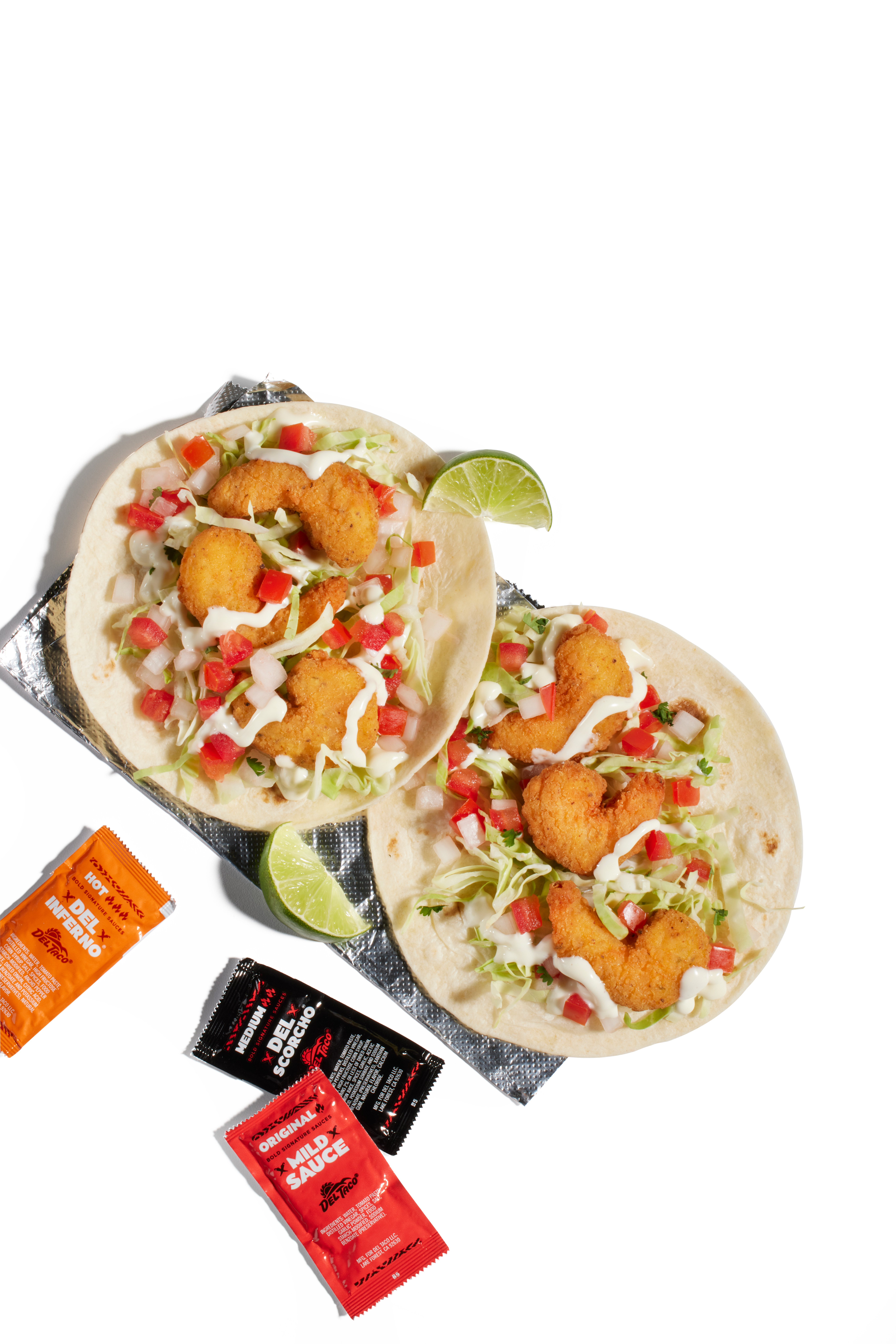 Jumbo Shrimp, breaded to a crispy and seasoned perfection, savory secret sauce, crunchy shredded cabbage, and pico de gallo all wrapped in a warm flour tortilla and served with a fresh-cut lime wedge.