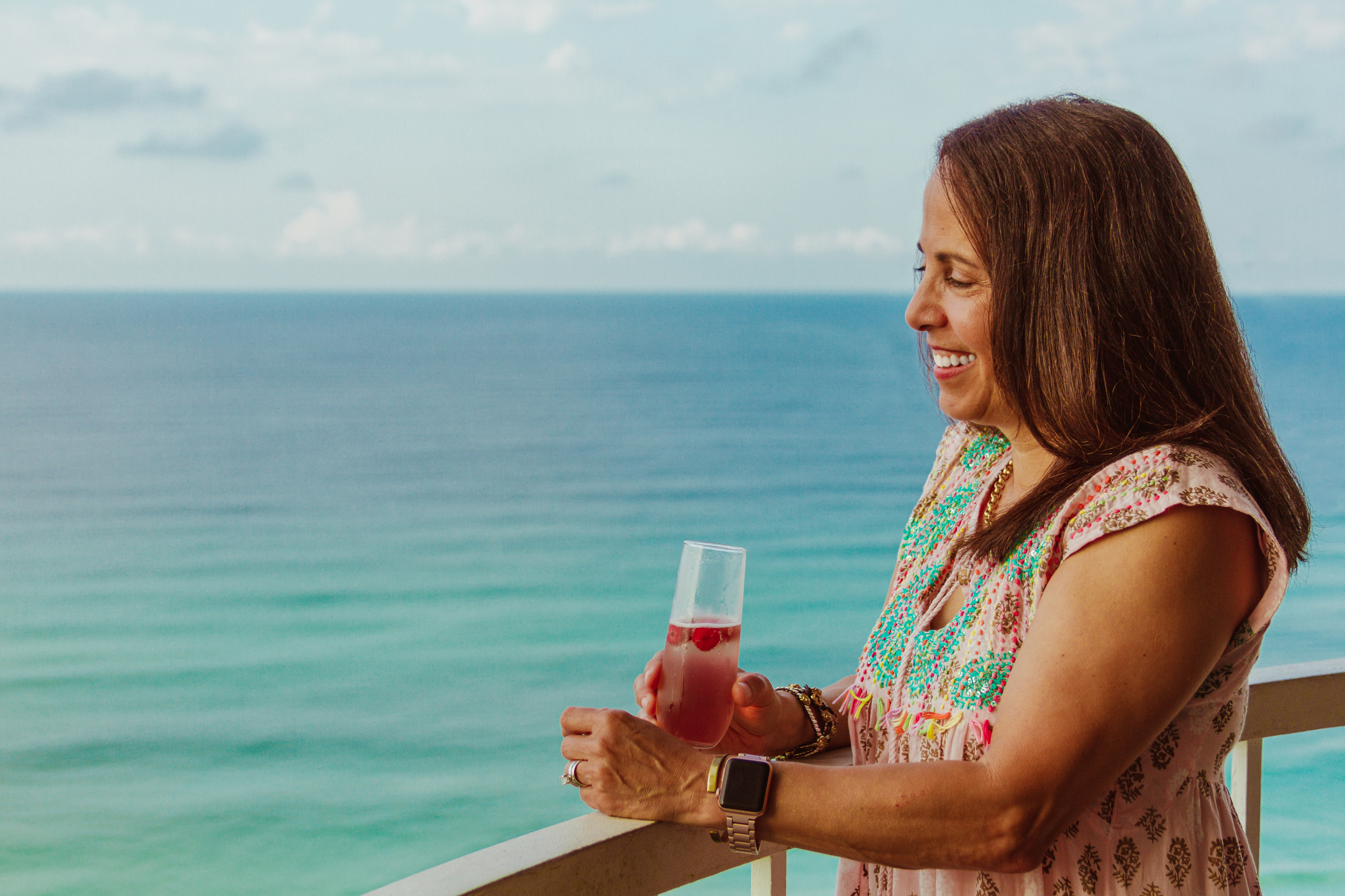 A Mom enjoying a moment to herself during her MOMosa vacation at Hidden Dunes Beach & Tennis Resort in Miramar Beach, Flroida. 