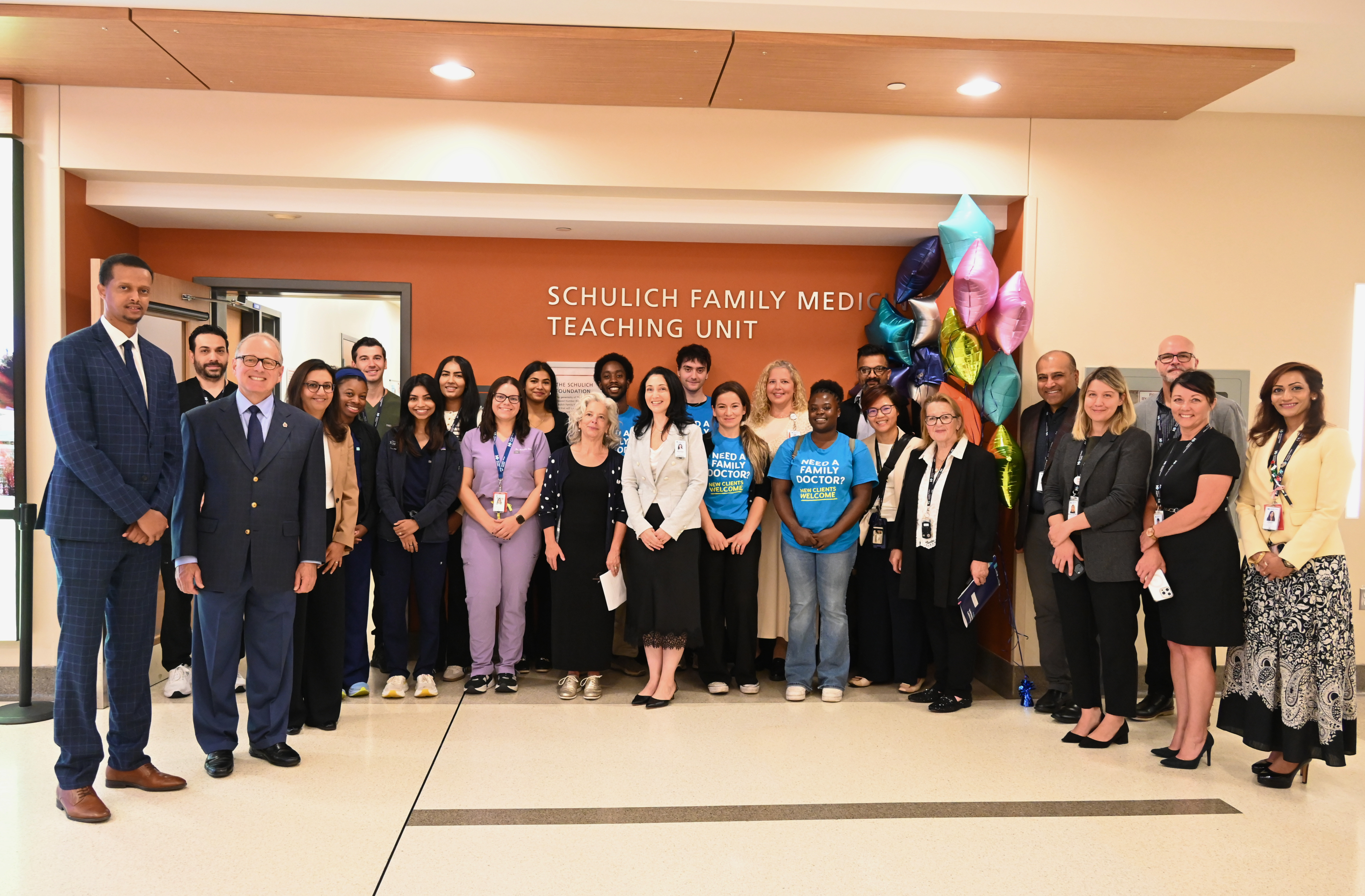 The Honourable Michael S. Kerzner, Mohamed Firin, healthcare leaders, Schulich Family Medicine Teaching Unit residents, and community partners celebrate a new partnership that will expand access to team-based primary care across North Western Toronto.