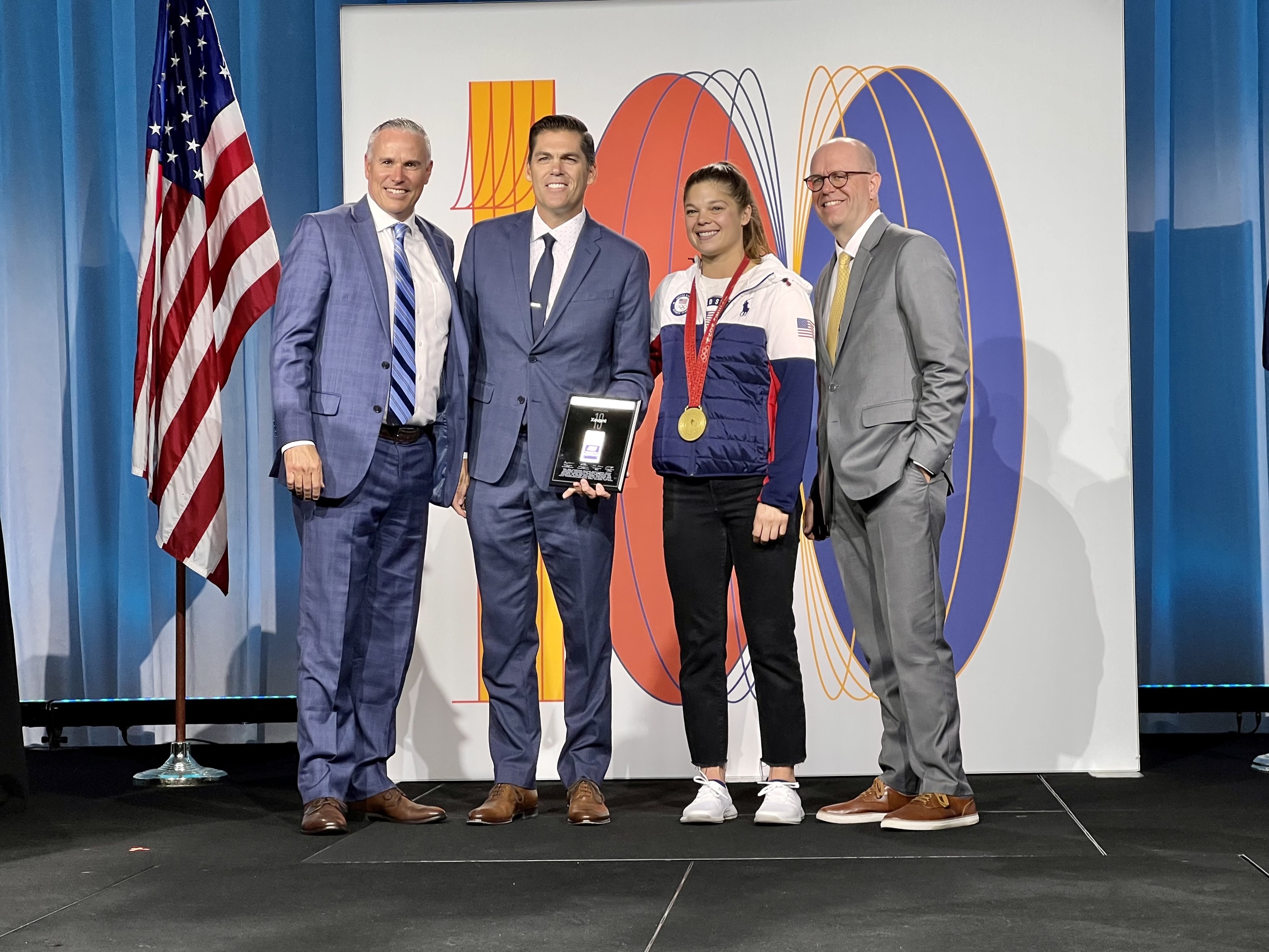 Pictured left to right: Jason Roberts, Utah 100 Committee Chair; Brandon Newman, Xevant CEO; Ashley Caldwell, Olympic gold medalist; Ryan Dent, MWCN President