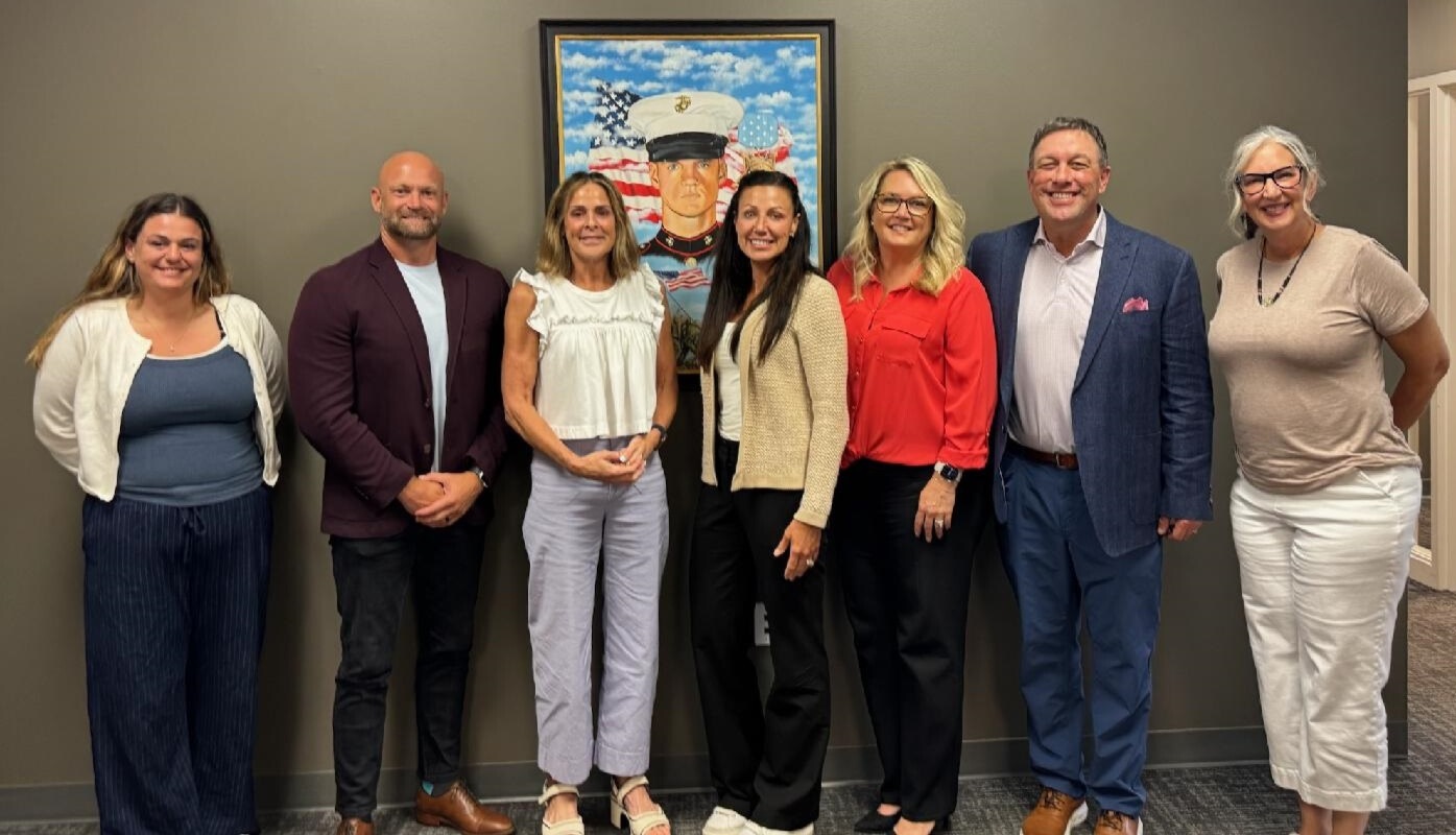 Dunham House will partner with CrossMed Healthcare Staffing to fill medical staffing needs when its long-term residential community for 30 veterans opens in fall 2026. Pictured are Wounded Warriors Family Support's Ashlie Muller (far left), Kate McCauley (third from left) and Dr. Joann Schaefer-Haines (far right) and CrossMed Healthcare Staffing's Chris Johnson (second from left), Amber Barna (fourth from left), Laura DiPrima (third from right) and Todd Starlin (second from right).