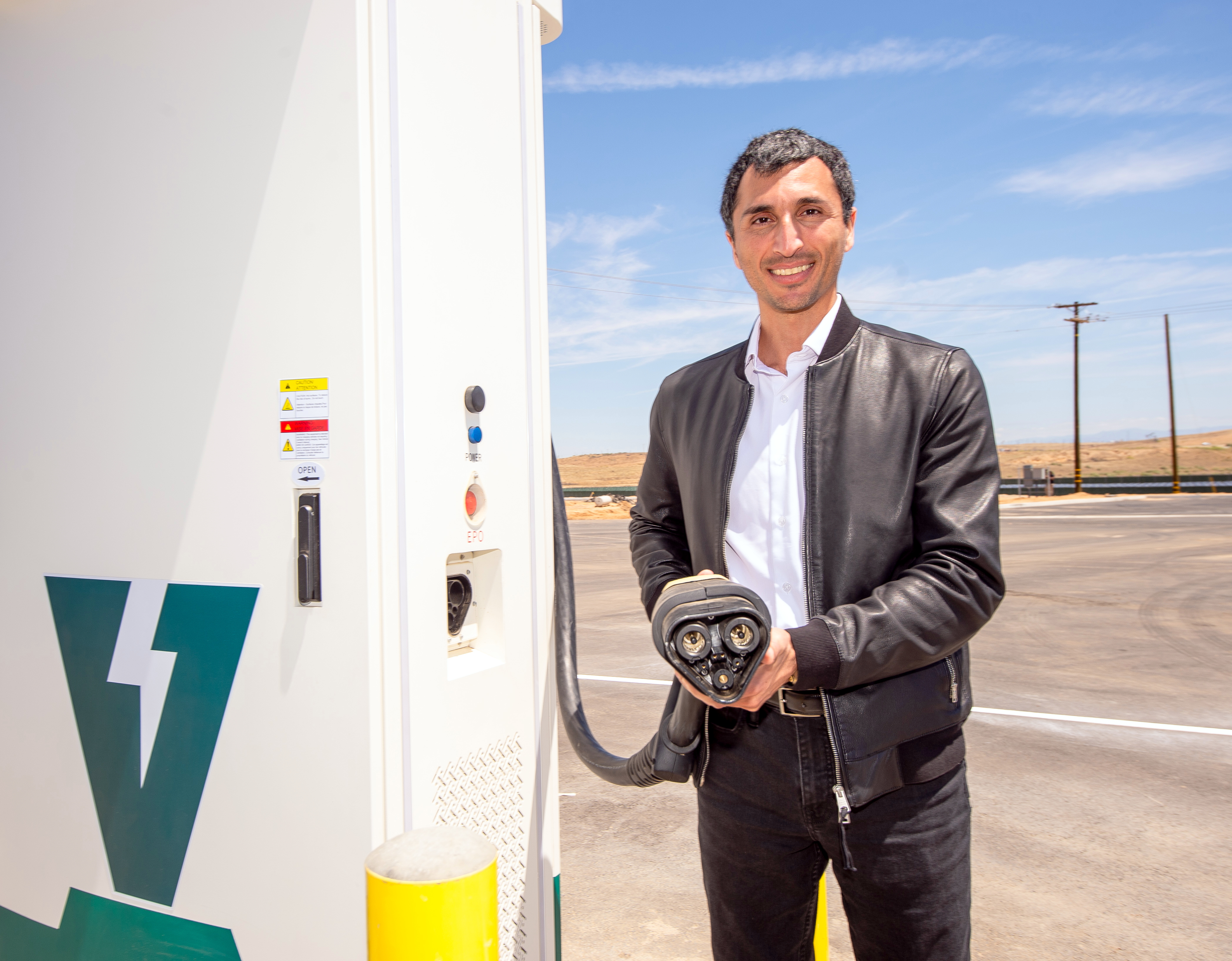 Salim Youssefzadeh is pictured at one of WattEV's newest charging stations in Bakersfield, CA