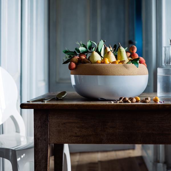 Made in France of all-natural materials, the ceramic bowl helps keep fruit and root vegetables fresh longer.