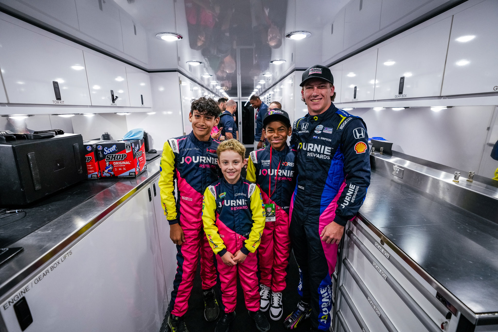 The Journie Driving Academy meets Kyffin Simpson, driver of the No. 8 Journie Rewards Chip Ganassi Racing Honda, on July 18, 2025, at Exhibition Place in Toronto, Ontario. Simpson would go on to score his first NTT INDYCAR SEREIS podium finish later in the weekend at the Ontario Honda Dealers Indy Toronto, finishing third in the race.