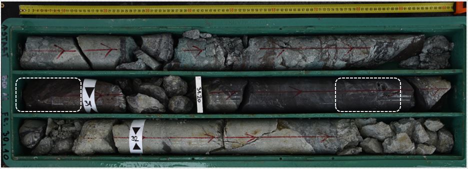 CMVDD001 drill core from 30.1 to 32.6 m showing sulphide cemented breccia and semi-massive sulphides. Details of dashed rectangles are outlined in Photo 2 and 3 below.