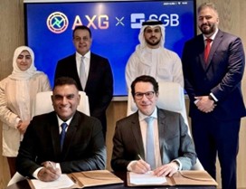 Seated left to right: Xavier George (CEO of AX Coin) and Frederic Boissieras (Director of SGB’s Financial Institutions Group). Standing left to right: Huda AlJawad (HR of AX Coin), Ali Moosa (Executive Vice Chairman of SGB), Mohamed AlEbrahim (Stablecoin Product Lead of AX Coin), Mohamed AlHashemi (Head of Reserve, Custody and FI of AX Coin).