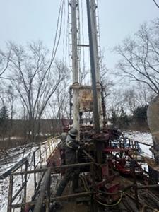 Pictured: A member of Zefiro’s on-site crew at Cuyahoga Valley National Park near Akron, Ohio helping seal an unplugged oil well.