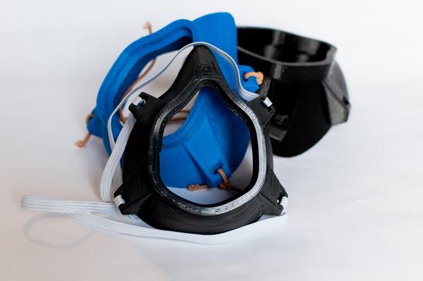 The BolivAIR mask is a breathable, reusable respirator mask. It gets its name from the 3D-printing group that designed it, Bolivar. While the design is like other 3D-printed masks, the BolivAIR design team worked with local first responders and medical professionals to add the following design updates: 

1, Enlarged filter area to allow usage of HEPA filter media and improve breathability
2. Increased strap hole size to allow 1/2″ and 3/4″ elastic for a comfortable, secure fit
3. Mounted filter outside to reduce risk of inhaling fibers from the cut filter