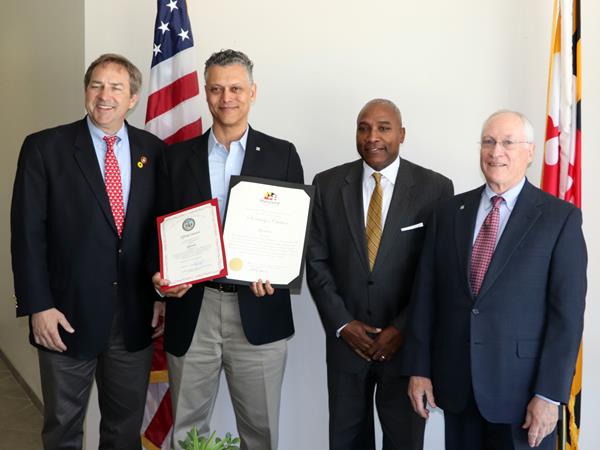 Qlarant received citations in honor of their 50th Anniversary from Maryland State Senator Johnny Mautz and Maryland Secretary of Commerce Kevin Anderson