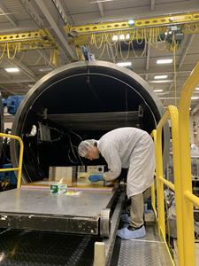 During the thermal vacuum (TVAC) test campaign at NASA’s Goddard Space Flight Center, Greenbelt, Maryland in June, Dr. Daniel Shy, a Co-Investigator on the ComPair Program, inspects the NRL-led CsI calorimeter box.