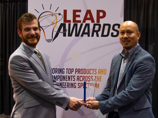 HEIDENHAIN’s Daniel Wiseman (left) and LJ Macaraeg accept the silver LEAP awarded to ETEL for its ground-breaking TELICA motion platform.

