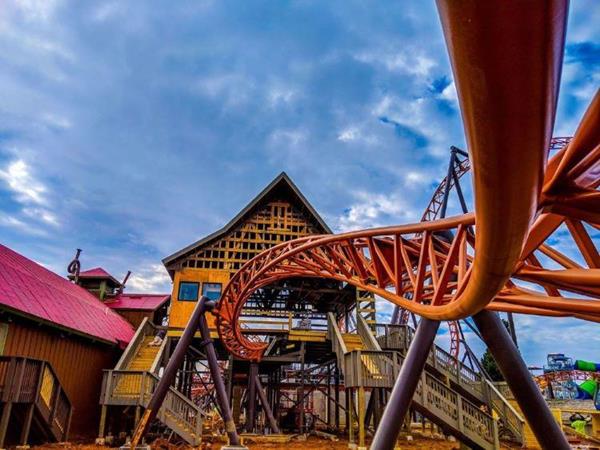 Copperhead Strike's twisted serpent-like track takes a slow barrel roll, or jojo roll, out of the station prior to sending riders through two launches and five inversions.