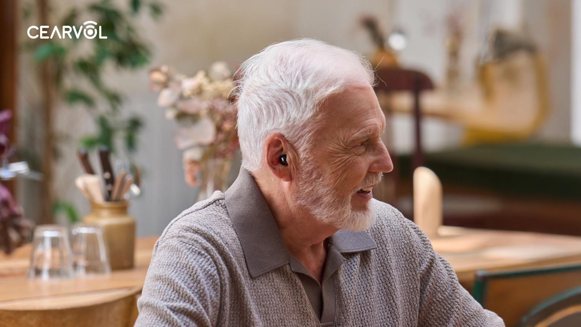 An elderly person using a Cearvol Nano product, demonstrating its user-friendly features