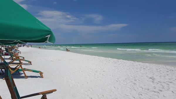 Destin's white sand beaches are popular for summer vacations. 