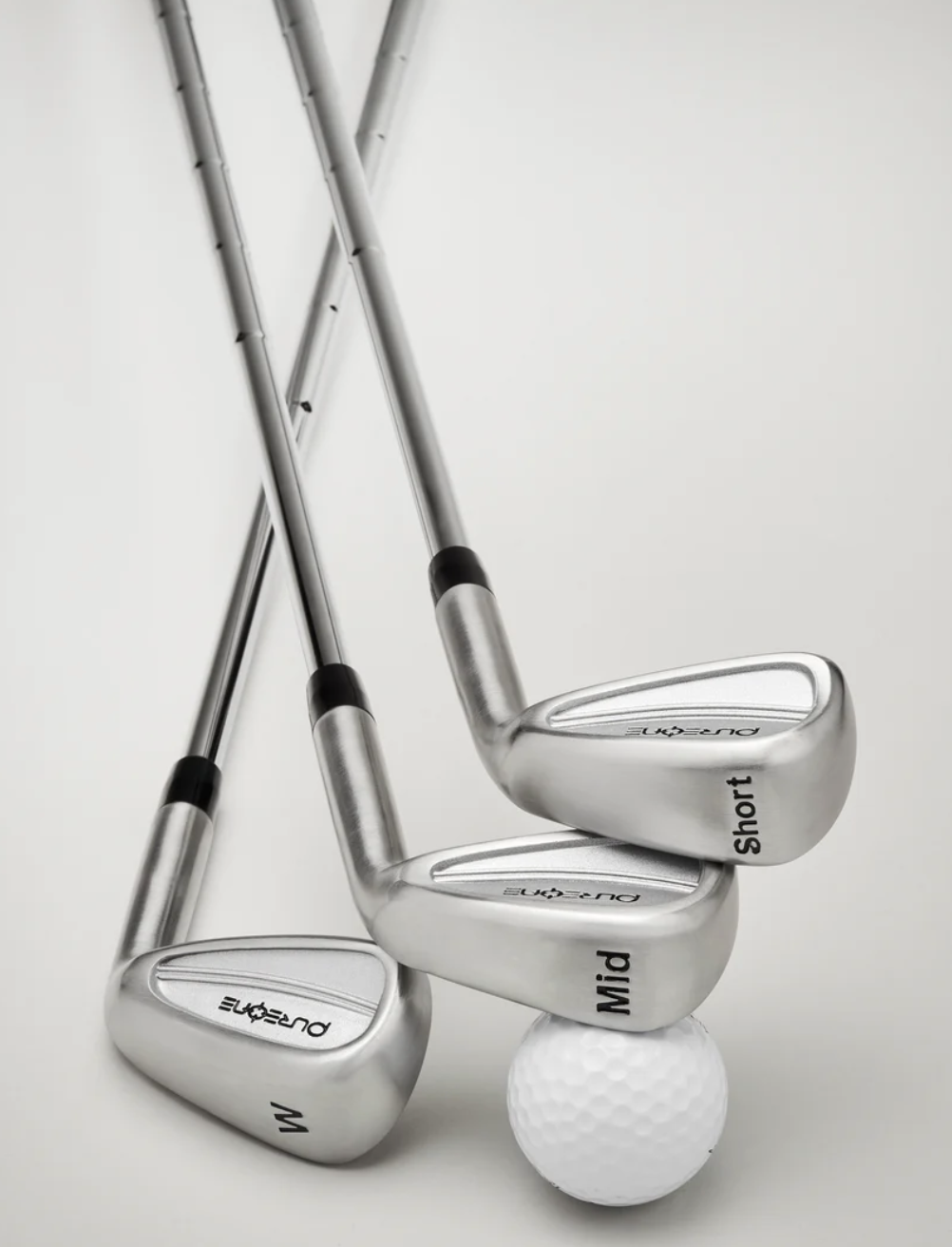 Our ultimate practice set, the PureOne Bundle includes each of the three training clubs in our arsenal (The Mid, The Short, and The Wedge), giving you all the tools in your golf bag to dial in your focus, tempo, and ball-striking.Rotate through each of the clubs during your next golf lesson or driving range session, or have some fun by using them on a short course against your friends.