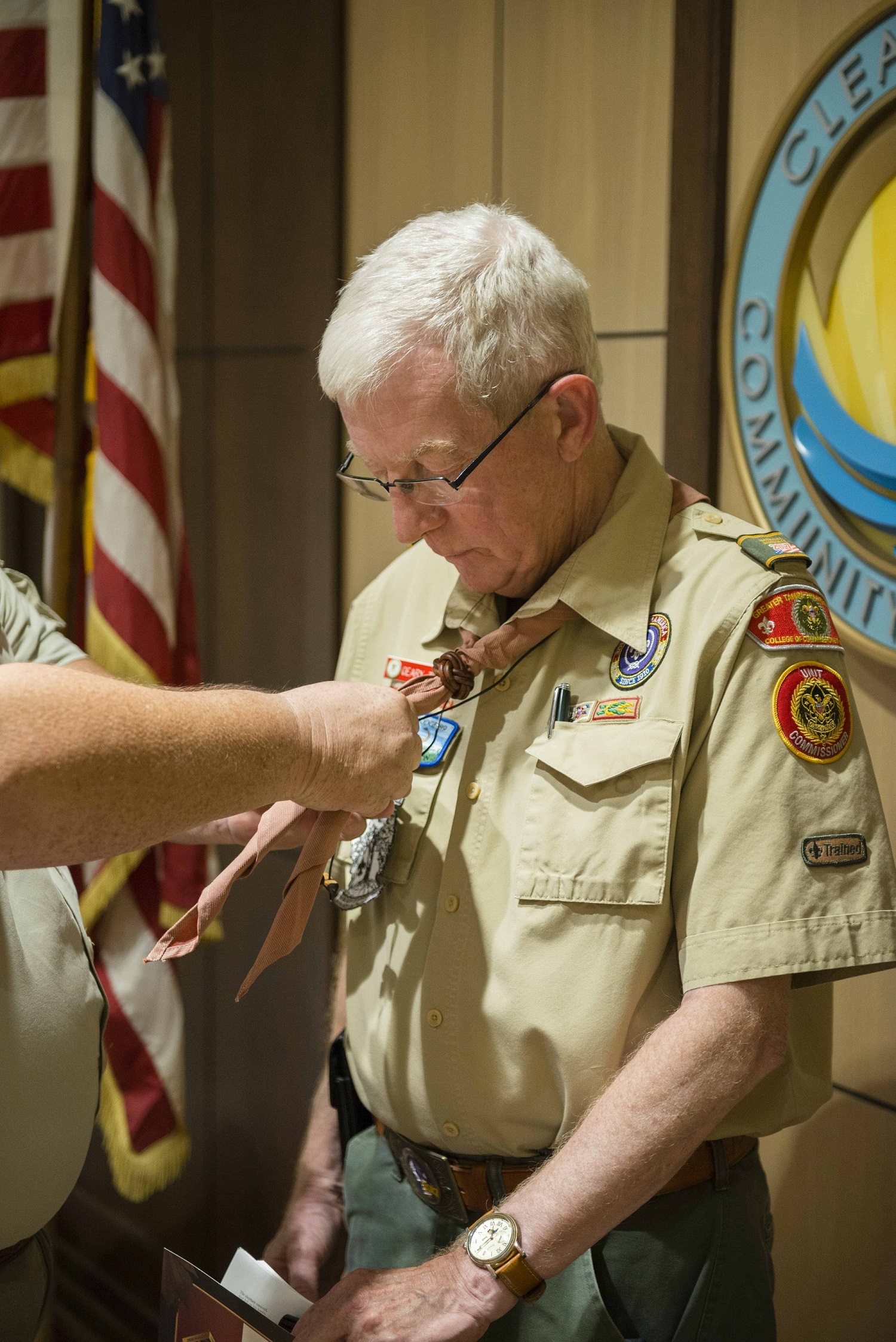 Geary Titus receiving his Wood Badge tie