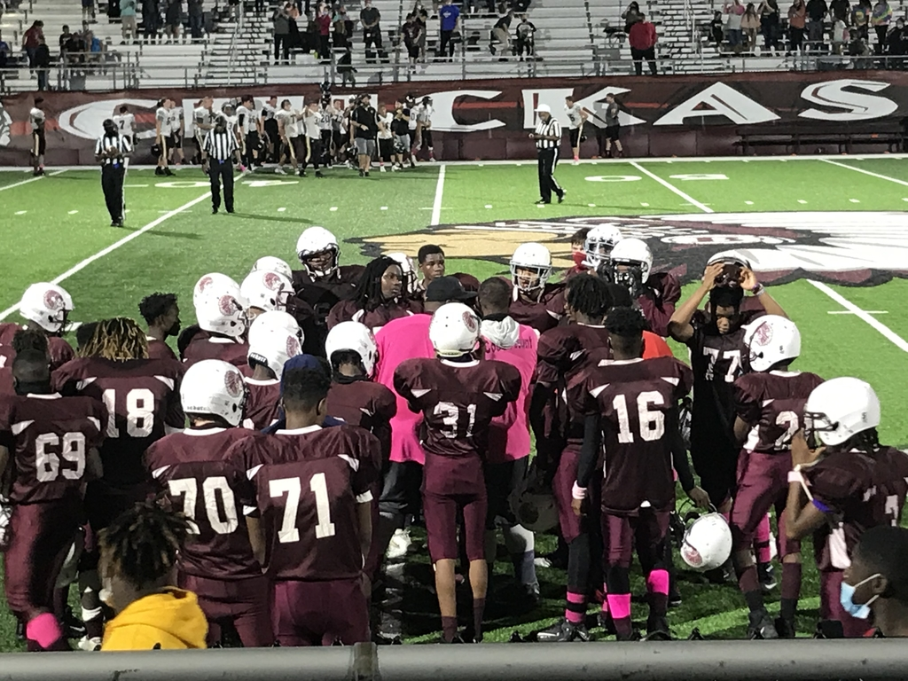 Blytheville High School football players huddled one last time before the football game ended.