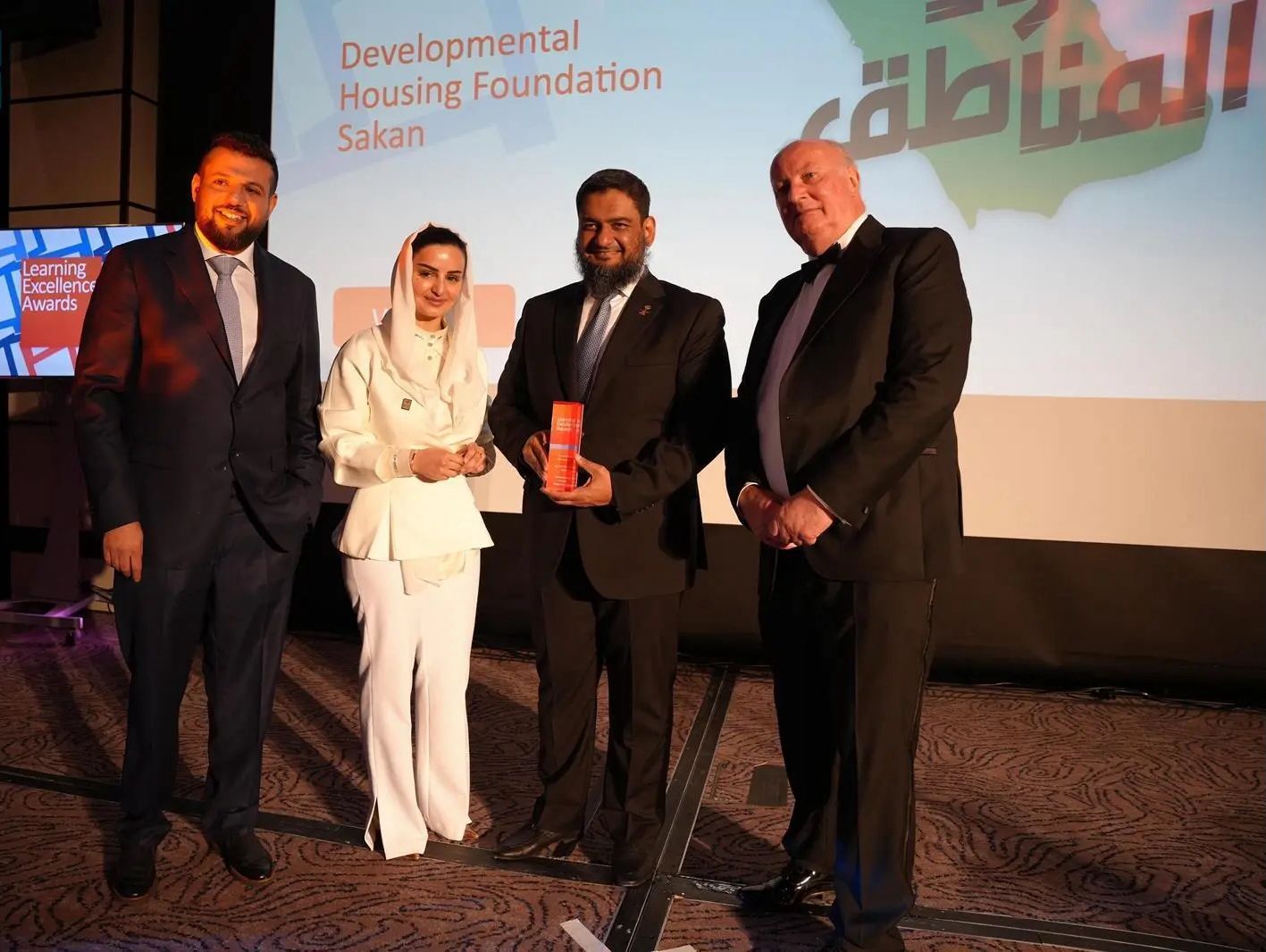Representatives of the Saudi Developmental Housing Foundation (Sakan) celebrate their milestone win at the Learning Excellence Awards in London. The foundation was recognized for developing society through excellence in education, community awareness, and providing innovative, sustainable solutions in the developmental housing sector.