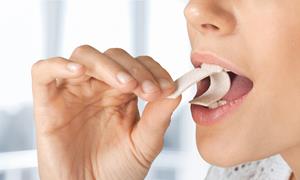 Chewing gum is whitened with titanium dioxide