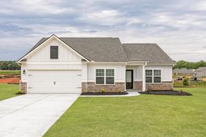 The Dockery at LGI Homes boasts a gorgeous exterior and professional front yard landscaping.