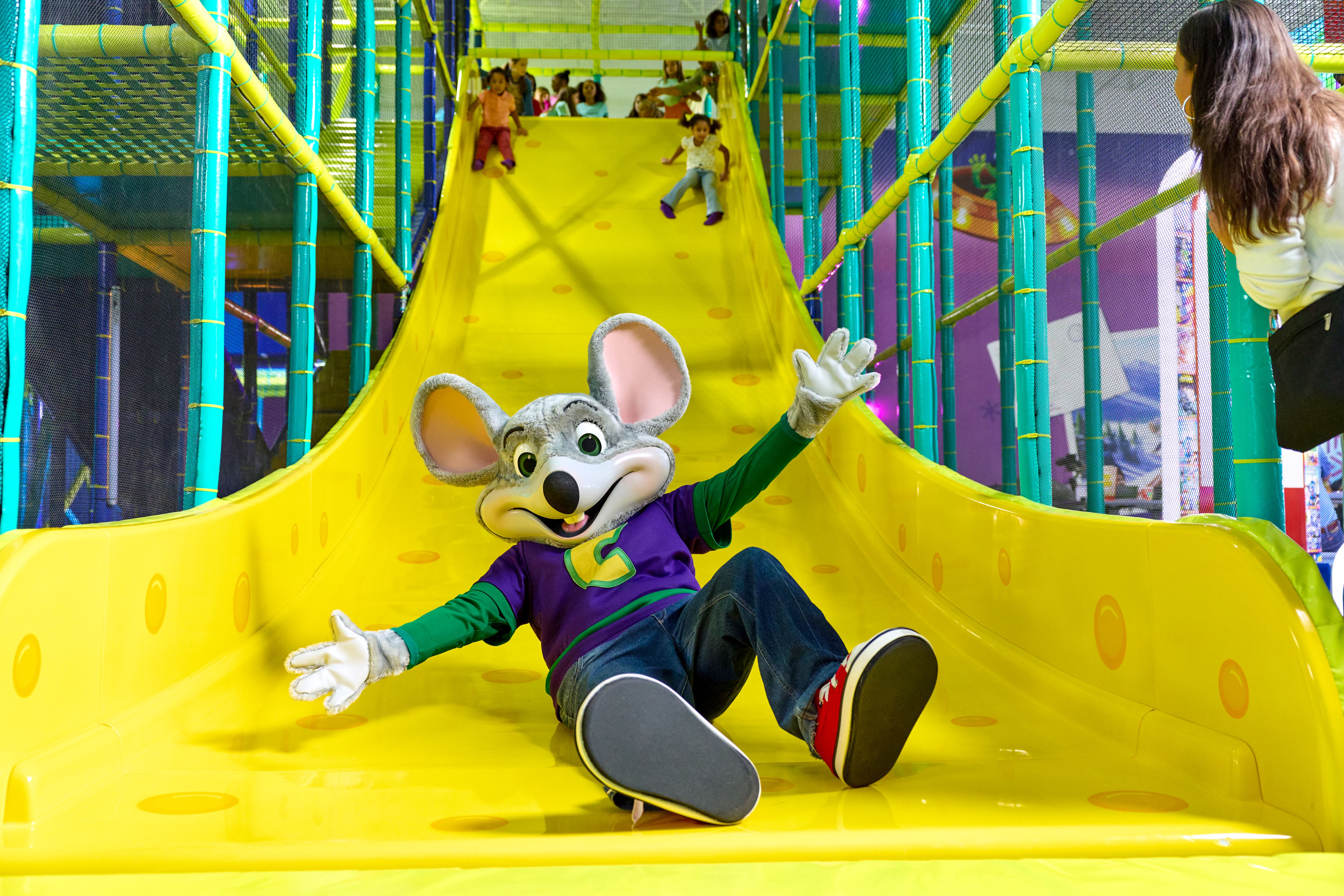 AW Kids and Parents Playing -- At Chuck E. Cheese Adventure World, kids and parents can play together, climb, slide, and explore the different themes 