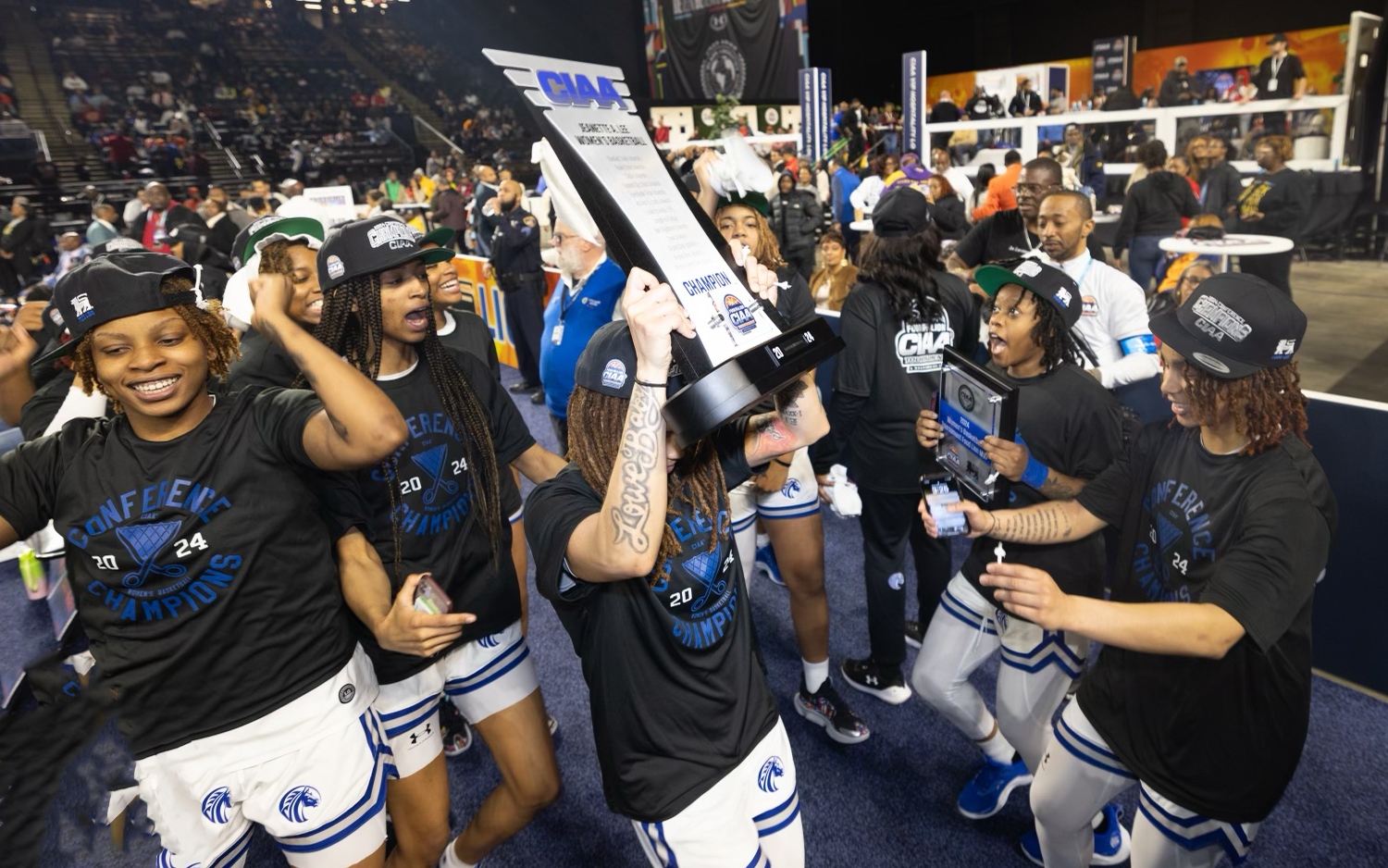 Celebrating with the CIAA Conf. Championship trophy