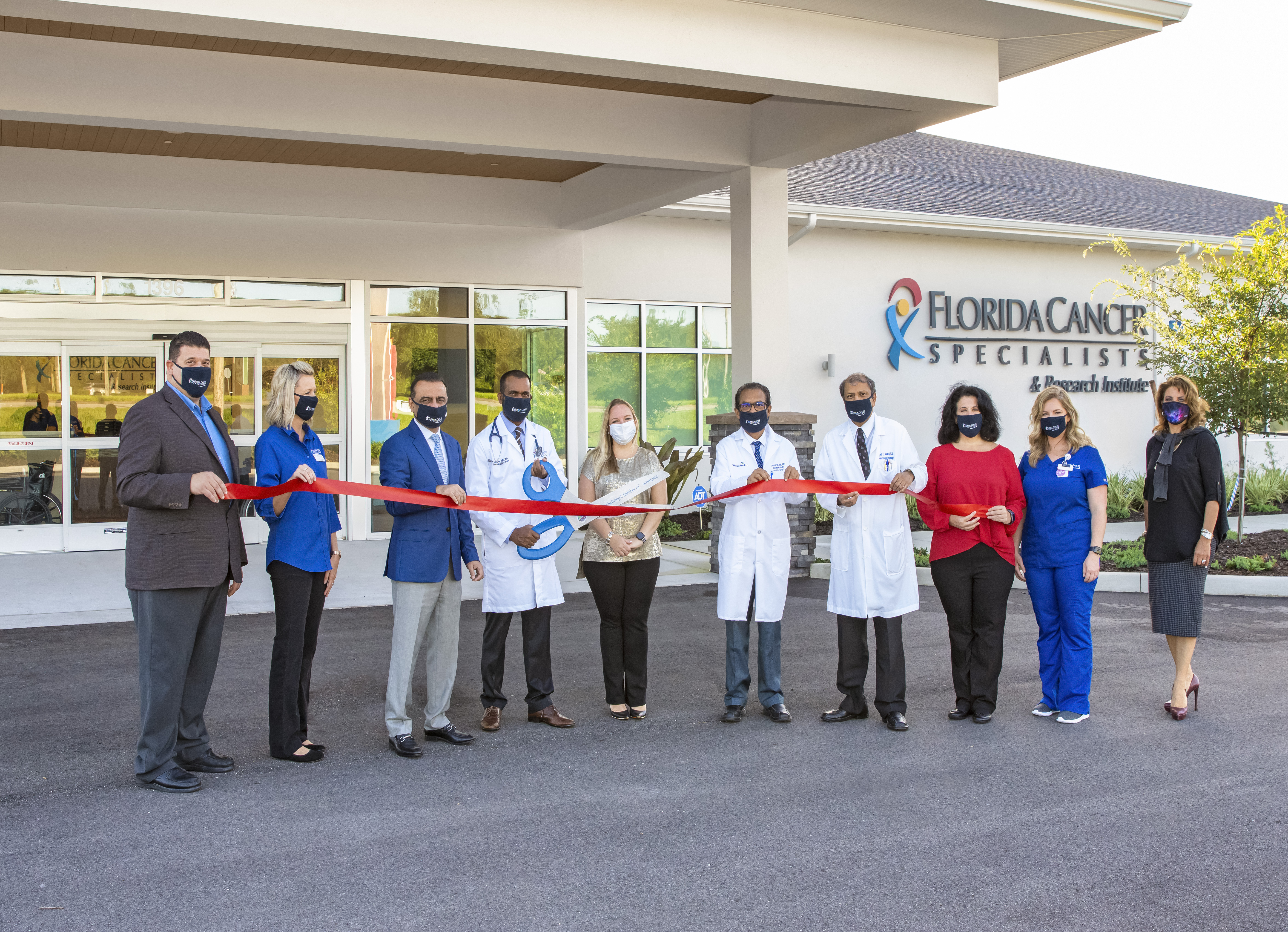 Florida Cancer Specialists Vice President of Practice Operations Jeffrey Rubin; Sebring Office Manager Susan Ferguson; Medical Oncologist & Hematologist Wasif Riaz, MD; Medical Oncologist & Hematologist Mahender Yellu, MBBS, MD, MHA; President & CEO of Sebring Chamber of Commerce Liz Barber; Medical Oncologist & Hematologist Amit Shah, MD; Medical Oncologist & Hematologist Syed Ahmed, MD; Regional Director of Operations Jodi Lohnes; Sebring Head Nurse Gretchen Abbott, RN,BSN,OCN and Chief Marketing & Sales Officer Shelly Glenn cutting the ribbon at the new FCS Sebring location