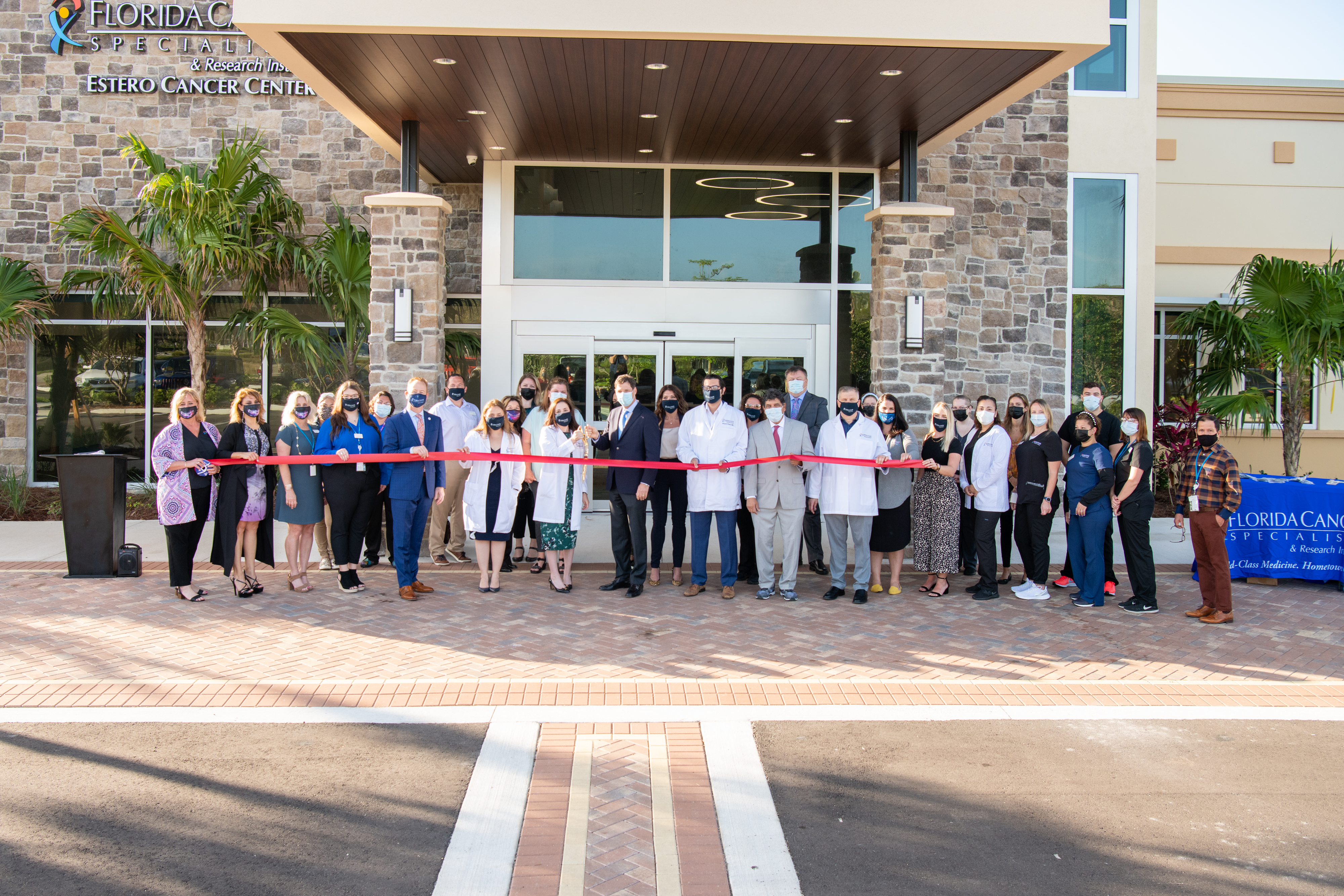 Florida Cancer Specialists physicians and staff celebrate the opening of the new FCS Estero facility in Lee County.