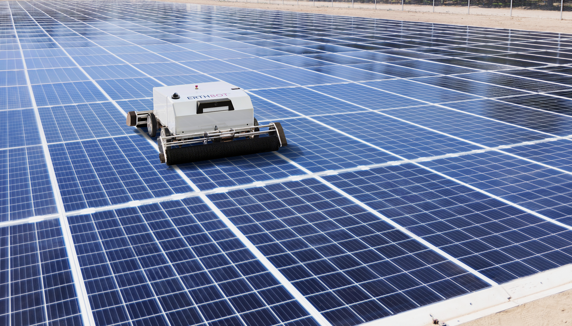 ERTHBOT™ Autonomous Cleaning Robot on Earth Mount Solar™ PV Array