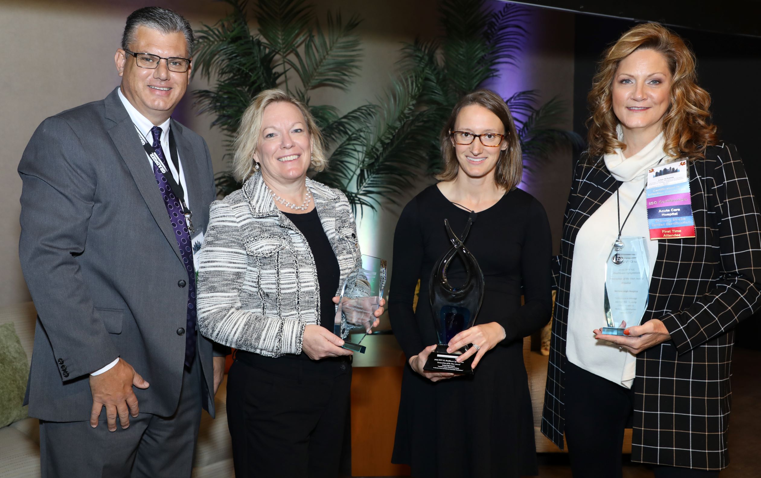 Patrick Horine, President, DNV GL Healthcare; Cheryl Melnyk, UCHealth Memorial Hospital Central - Runner Up; Katherine Collins, Sentara Leigh Hospital - 2019 DNV GL Healthcare Innovation Of The Year Award Winner; Lisa Scheels, Sentara Leigh Hospital - Runner Up