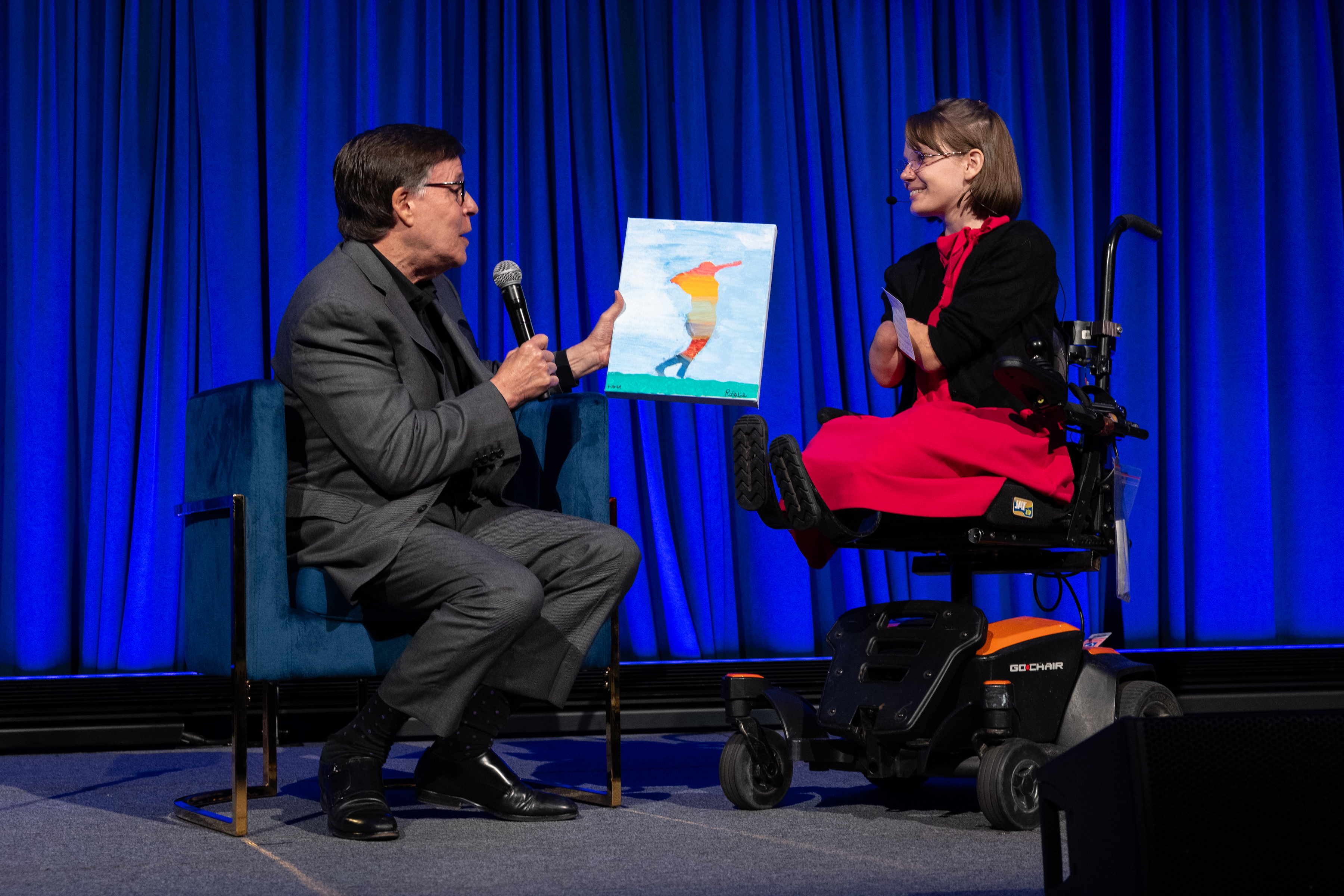 Legendary sportscaster, Bob Costas conducts an on-stage interview with Rosalie Parker, who shared her emotional story with the captivated audience.