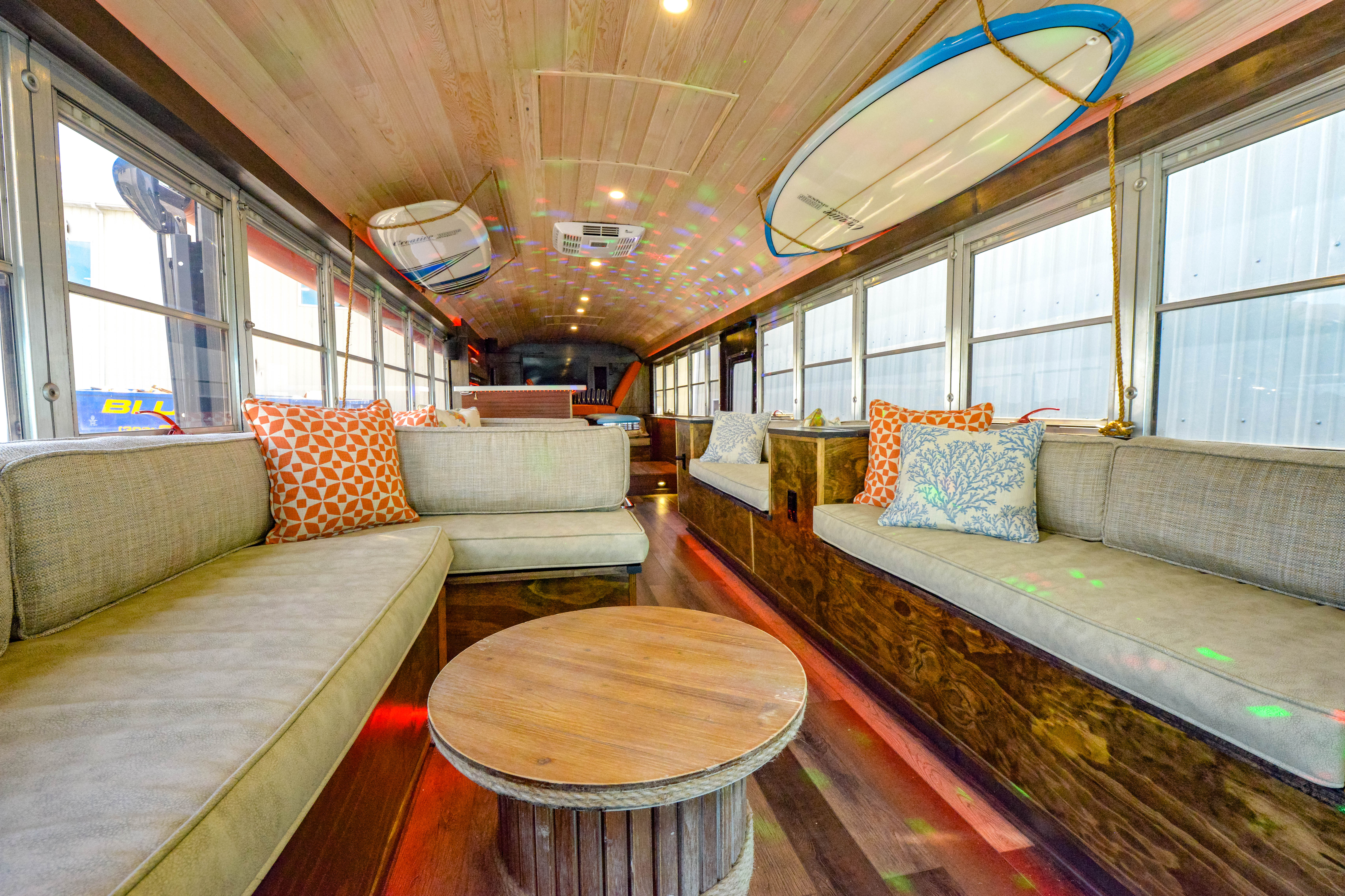 The interior of the Kudos Bus, known as the Kudos Lounge