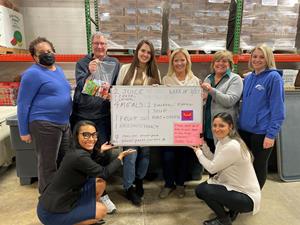 Associa volunteers prepared 700 power packs for the organization’s Power Pack Program, which provides weekend meals to Fairfax County school students.