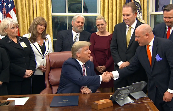 President Trump shaking hands with Animal Wellness Action's Executive Director, Marty Irby at last night's signing ceremony in the Oval Office. 