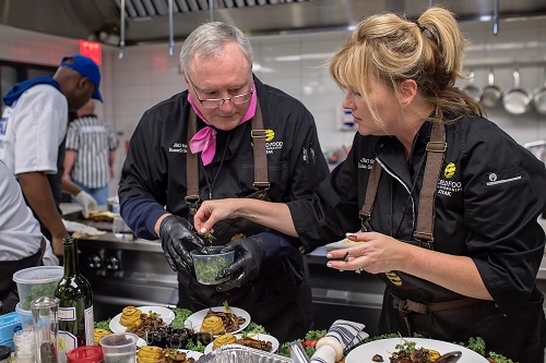 2017 World Food Champion, Lisa Gwatney puts the finishes touches on her dish.