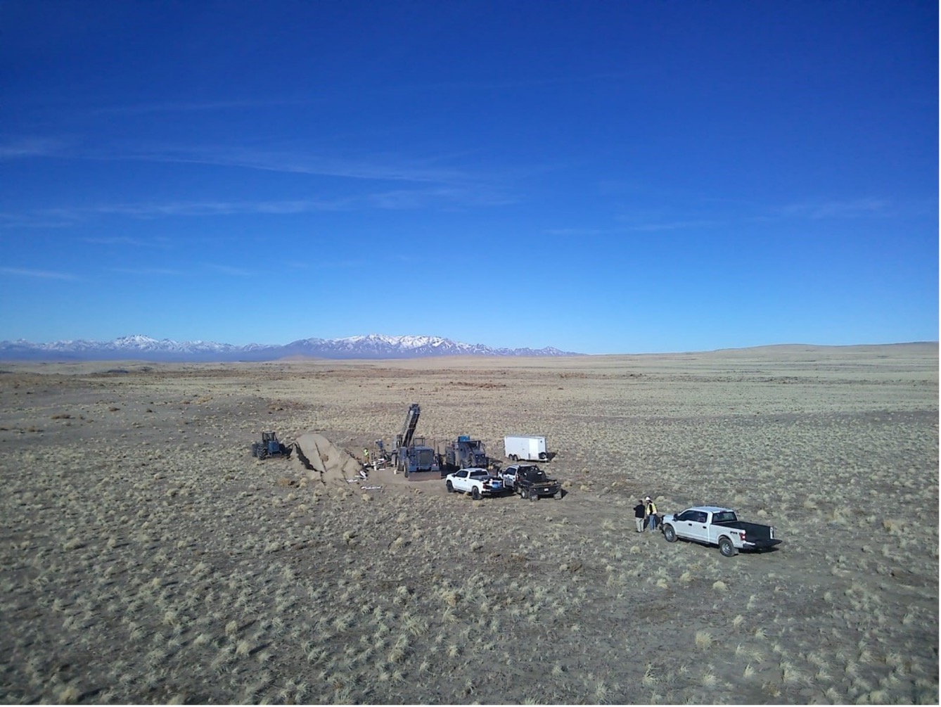 Photo of the RC drill rig positioned and drilling its first 2022 drill hole west of North Hill, within Sandman.