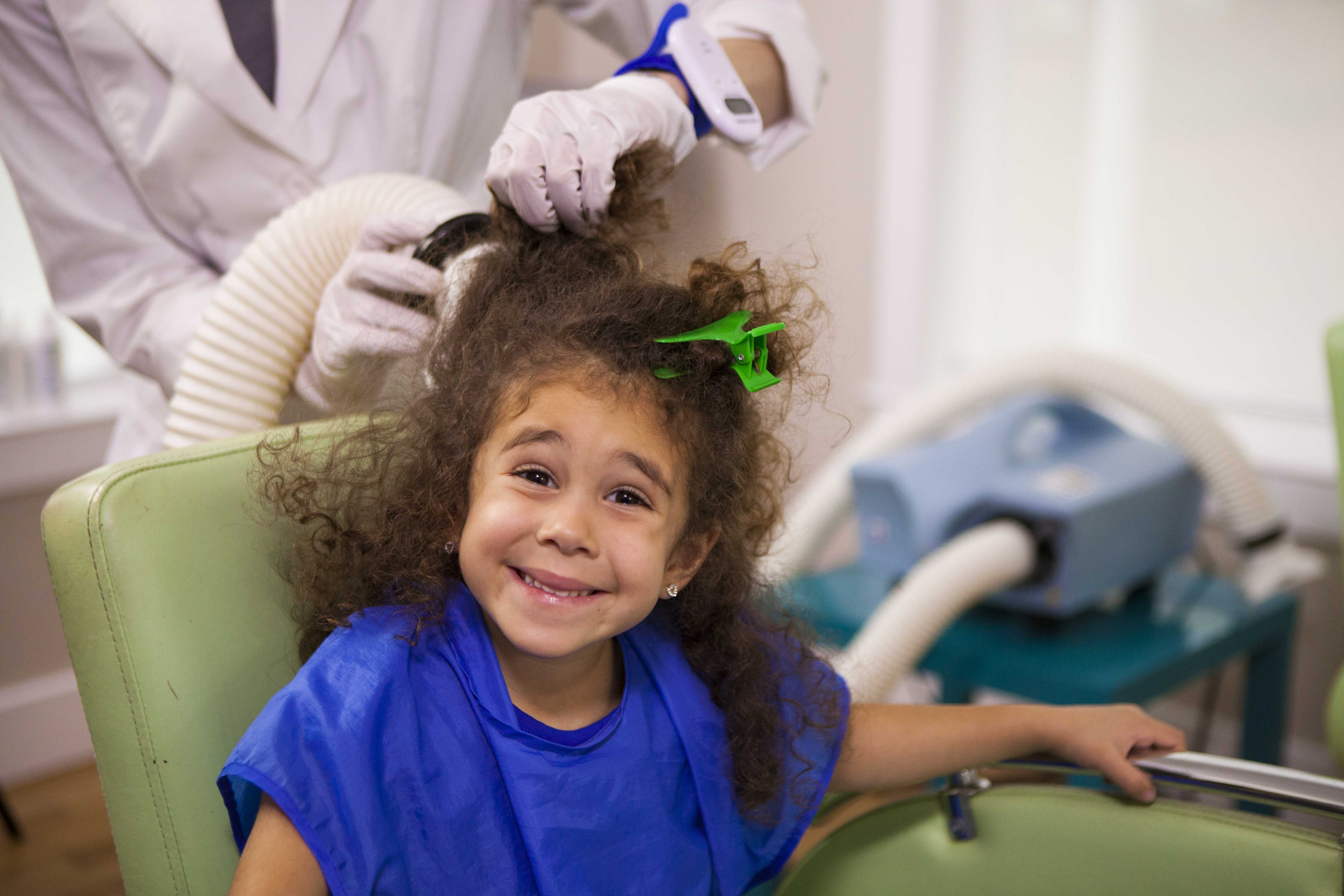 AirAllé device being used to treat a young girl