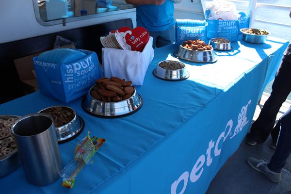 Guests enjoy a bountiful buffet and dessert bar with free flowing champagne and mimosas while Fido gets a doggie bag of treats and samples from partner PETCO.