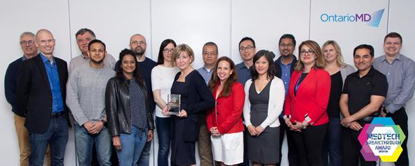 The OntarioMD HRM team proudly accepts the MedTech Breakthrough Award