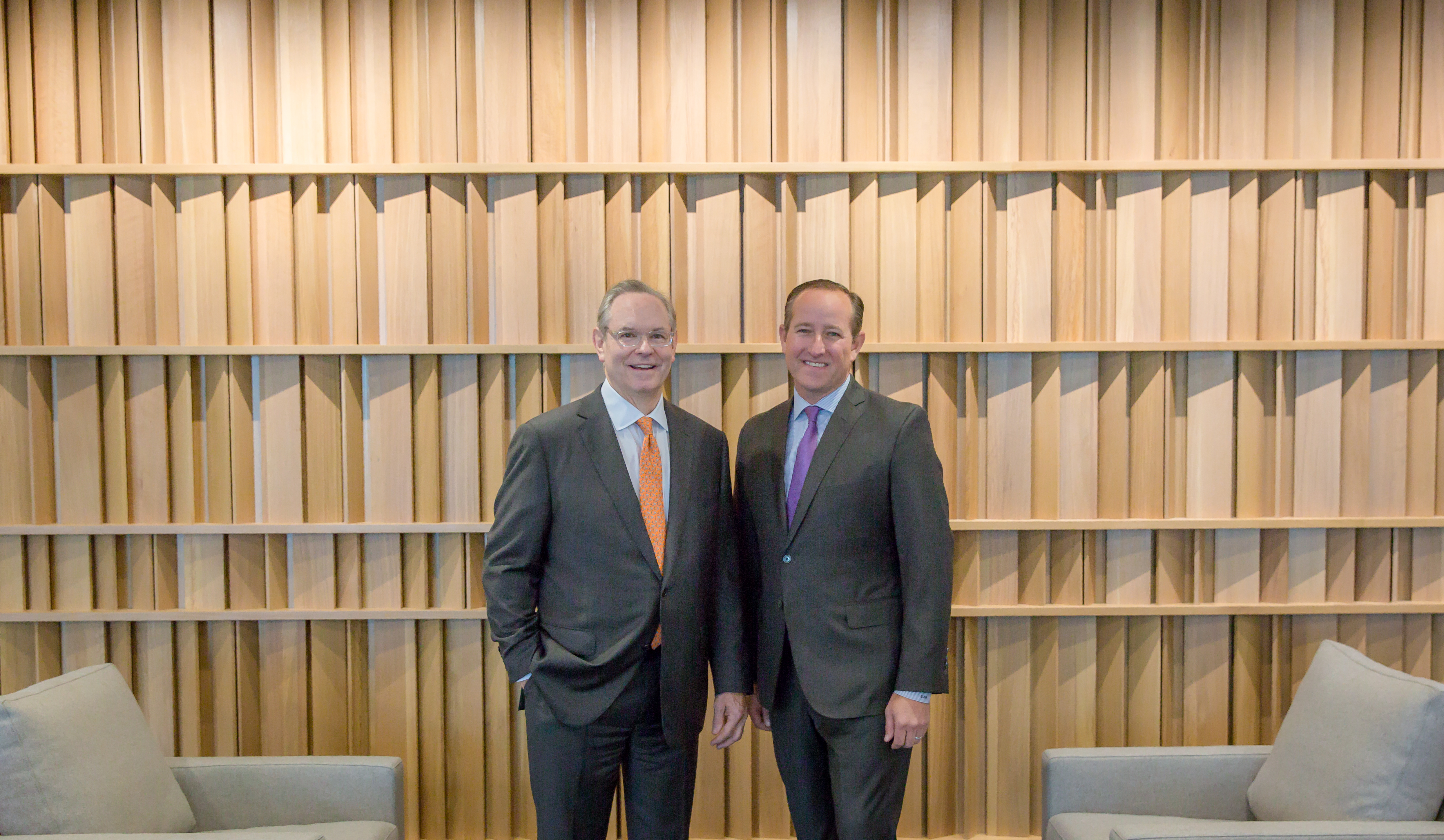 Todd Mansfield (left) and Brian Natwick at the new Crescent Communities office in the Ally Charlotte Center building.