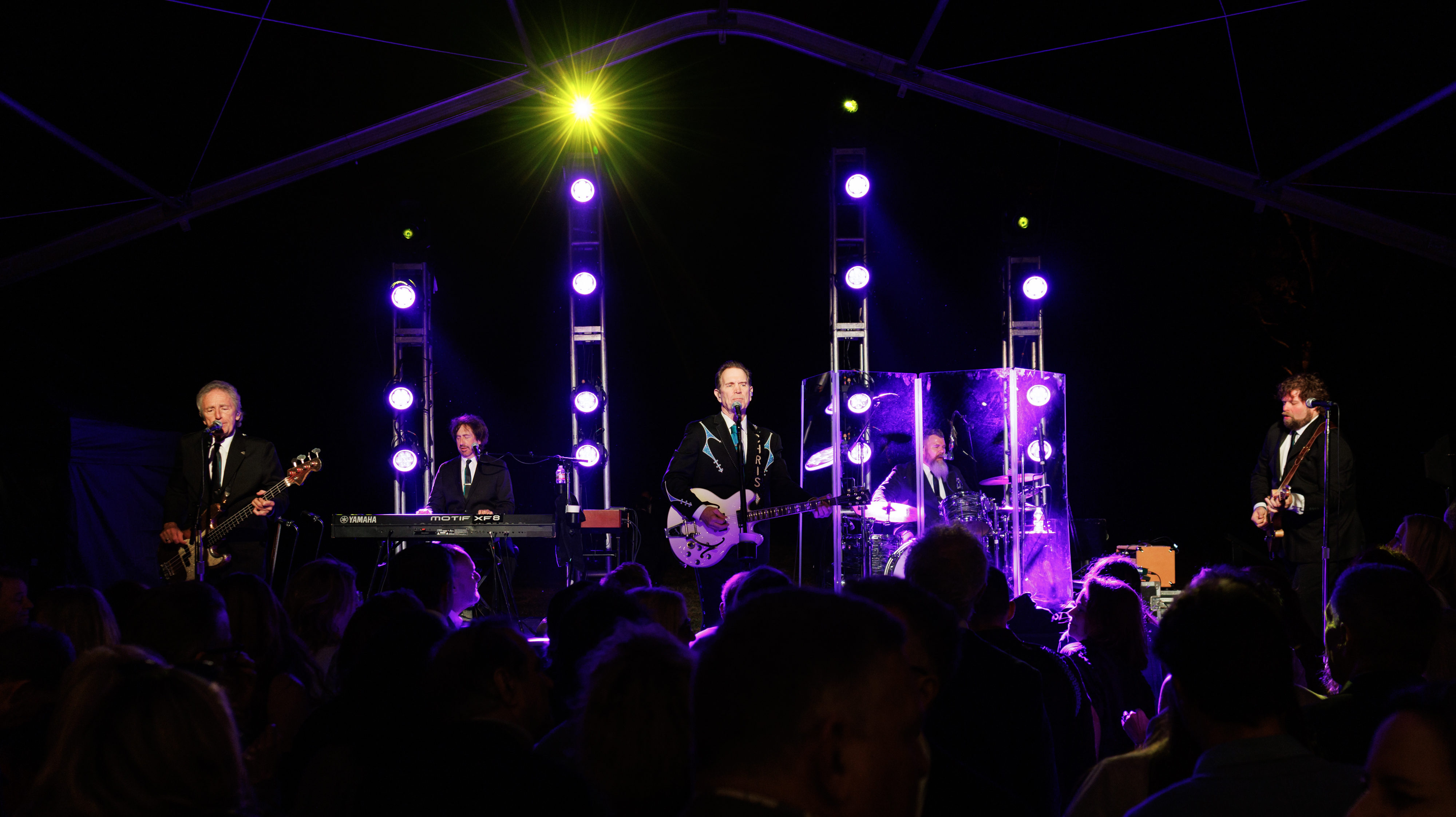 Chris Isaak and his band Silvertone closed the evening in concert.