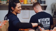 Two First West team members volunteer at a local food bank through The Full Cupboard signature cause program