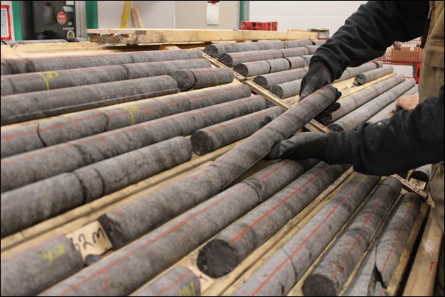 Image of drill core from hole R-0013 highlighting the consistent and extensive rhythmic oxide layering.