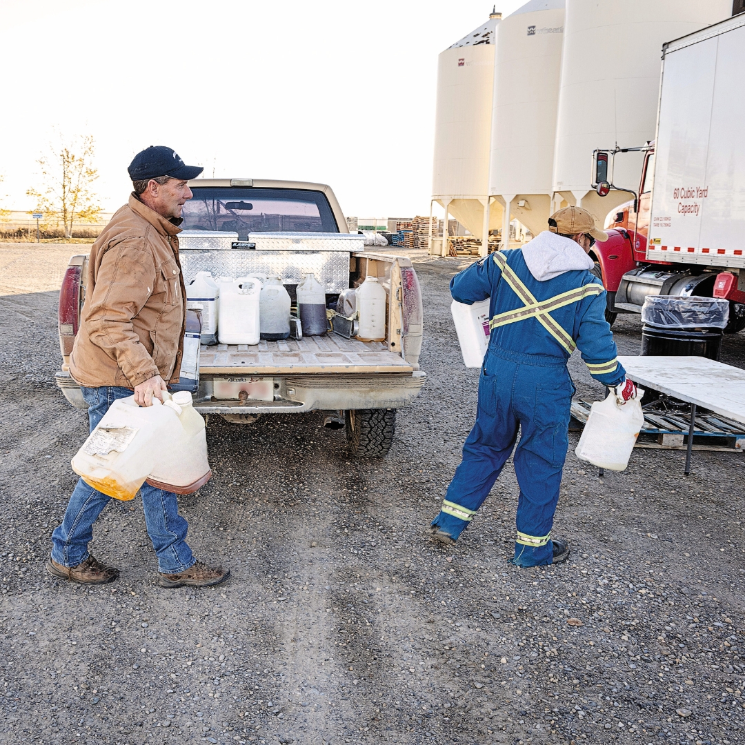 Farmers bringing Unwanted and obsolete agricultural pesticides & livestock/equine medications to a Cleanfarms collection site