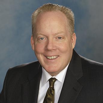 Gerald F. Sullivan, Principal and Managing Broker of PW Commercial/TCN Worldwide in Chicago