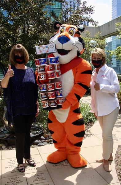 Tony the Tiger joined Sheila Musolino (LEFT), President and Chief Executive Officer, Ronald McDonald House Charities and Wendy Davidson (RIGHT), President of Kellogg’s Away From Home to kick off the Kellogg cereal donor program which will deliver complimentary breakfasts for years to come to parents staying at a Ronald McDonald House while their child is receiving treatment at a nearby hospital. 